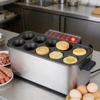 Machine commerciale automatique antiadhésive à 10 trous pour la préparation de saucisses aux œufs, d'omelettes et de hot-dogs