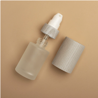 Offre Spéciale 1oz 2oz 4oz 30ml 50ml 60ml 100ml 120ml Pompe de lotion cosmétique givrée Flacon pulvérisateur en verre à brume fine avec couvercles en bambou