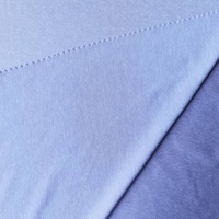 Poliéster cationico gris jaspeado con elastano, punto sencillo de 180 g/m², tejido atlético transpirable, elástico y resistente a las arrugas para niñas.