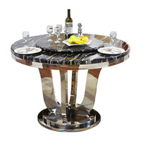Moderner minimalisti scher luxuriöser Esstisch aus Edelstahl marmor Home Dining Runder Tisch mit rundem Plattenspieler-Tisch und Stühlen