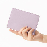 Porte-passeport en cuir PU en stock, étui de protection de voyage tendance avec logo personnalisé