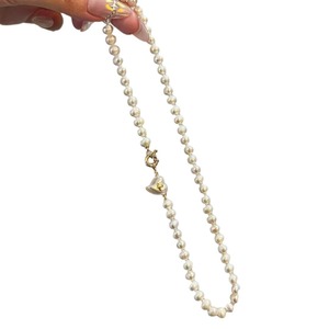 Collier de luxe haut de gamme en perles d'eau douce naturelles pour femme, perles de millet avec pendentif nœud léger et luxueux pour la clavicule - Product Image 5