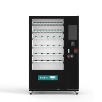 Distributeur automatique de snacks et boissons froides en acier pour la Tunisie, acceptant cartes de crédit, QR codes et jetons, idéal pour centres commerciaux et autres espaces.