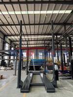 Système de stationnement intelligent Ascenseur de stationnement de voiture à 4 poteaux à triple empileur de haute qualité à vendre Équipement de garage de ville de stockage de 3 voitures