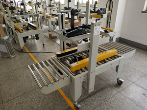 Macchina sigillatrice per sigillare nastro in cartone con guida laterale Semi automatica - Product Image 6