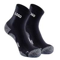 Échantillon gratuit avec emballage personnalisé Chaussettes de sport à tube court et coussinées en éponge Chaussettes de sport pour femmes et hommes Chaussettes de course, de randonnée et de sport