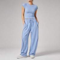 Ensemble de sport pour femmes, marque privée ODM, t-shirt côtelé à manches courtes, pantalon de jogging large, fabricant sur mesure