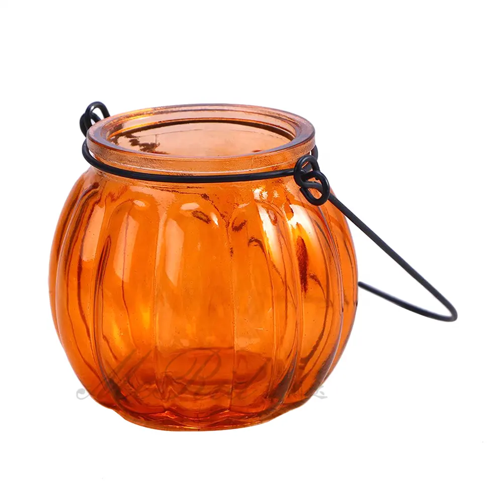 A forma di zucca lanterna di vetro Tealight portacandele con manico per Halloween eco-friendly