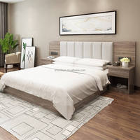 Ensemble de chambre d'hôtel commercial moderne 3 étoiles en bois massif écologique Lovezone à prix réduit avec design à panneaux pour appartement et usage scolaire