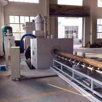 Machine de sablage COGEIM pour l'élimination de l'oxydation et le renforcement des surfaces de gros tuyaux métalliques, et le débavurage des moteurs électriques