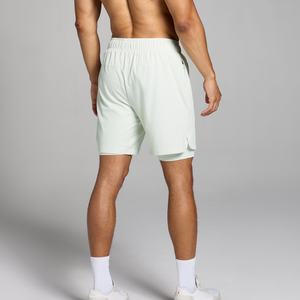 กางเกงขาสั้นกีฬาผู้ชายแบบสตรีทแวร์ปี 2025 ไม่มีซับใน เหมาะสำหรับการฝึกซ้อม ออกกำลังกายในยิม ผลิตจากโพลีเอสเตอร์ 100% กันน้ำ แห้งเร็ว - Product Image 2