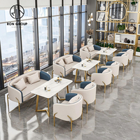 Meubles de table et de chaise de restaurant d'hôtel en marbre rond moderne de qualité supérieure, canapé de stand en cuir pour café, salon de thé