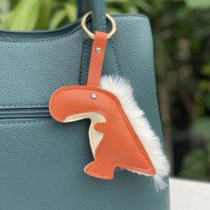 Expédition en 5 jours Porte-clés en cuir dinosaure pour sacs à main, sacs à dos et porte-clés - Pendentifs et breloques à motif animal de dessin animé - Product Image 2