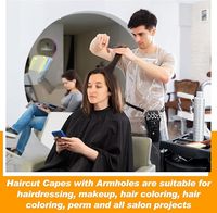 Cape de barbier professionnelle avec emmanchures Cape de coupe de cheveux noire avec fermeture à pression réglable Capes de salon imperméables