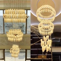 Lustre d'escalier de villa, nouveau modèle de luxe pour bâtiment duplex, avec motif floral et oiseaux en céramique rotatifs, LED, en acier inoxydable, pour installation de projet