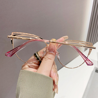 Lunettes Photochromiques Anti-Reflet Originales Cateye Noir Doré Sourcils Métalliques pour Femmes Verres Optiques Bleus