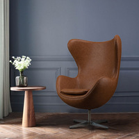 Fauteuil Egg pivotant, fauteuil lounge à dossier haut, en cuir PU capitonné, fauteuil d'appoint pour salon, balcon, hôtel