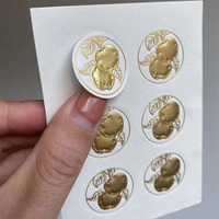 Etiquettes d'emballage de luxe d'usine Autocollant en relief Etiquette d'impression personnalisée de luxe en feuille d'or personnalisée