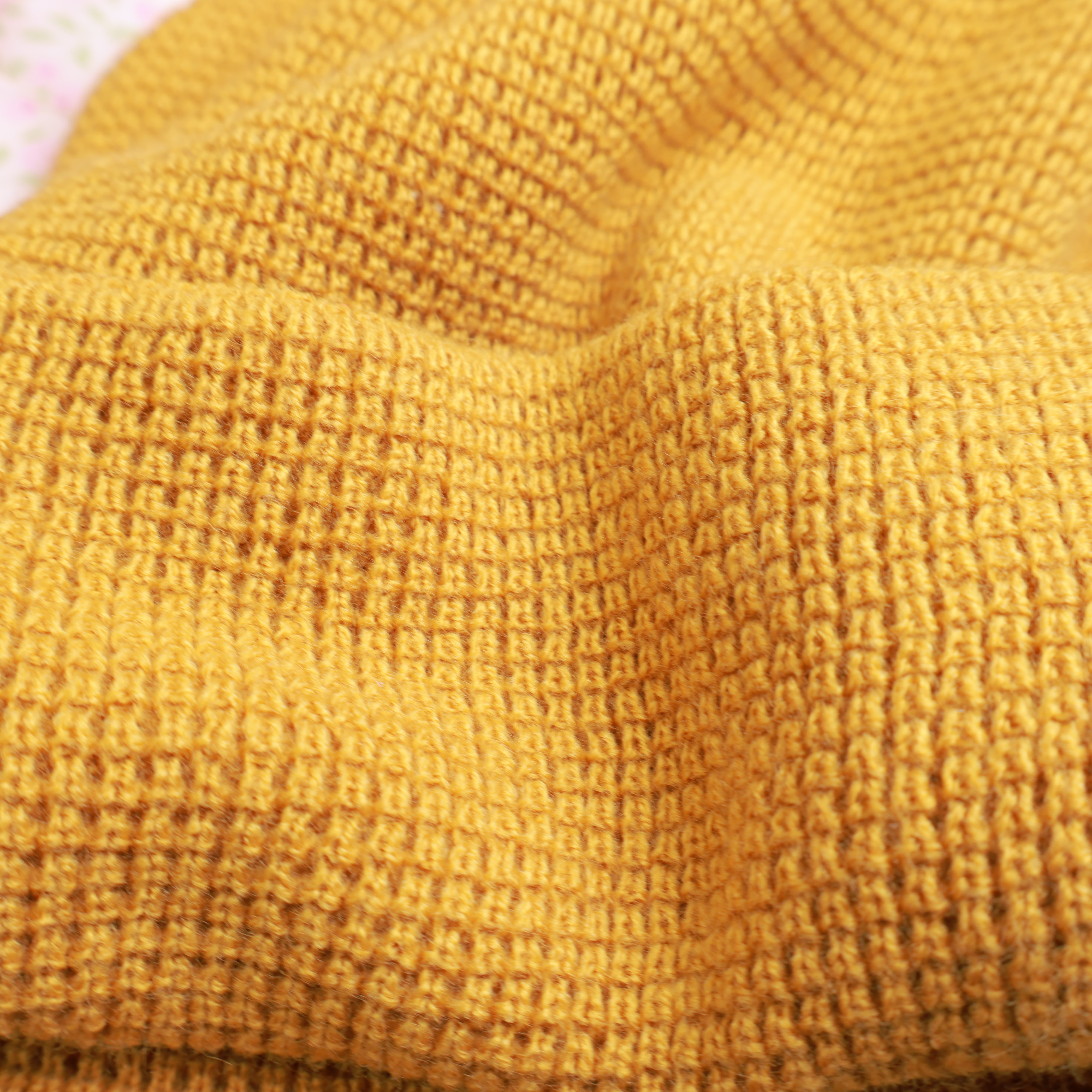 Waffle texture detail of knitted skullcap