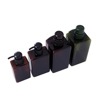 Bouteilles de lotion carrées en PET vert de 450 ml avec pompe pour cosmétiques et emballages de shampoing avec impression à l'écran et logo personnalisé