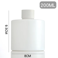 Großhandel 200ml Klare Glas-Rundflasche für Duftdiffusor mit Silberkappe, Bernsteinfarbener, Weißer, Schwarzer Leerer Duftbehälter