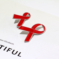 Broche papillon ruban rouge du fabricant, épinglette émaillée pour la sensibilisation au VIH/SIDA, badge de revers