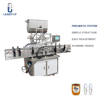 Ligne de remplissage et de bouchage de liquides à petite échelle pour l'embouteillage de boissons, d'aliments et de jus, pour usage en usine