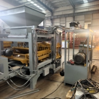 Presse à briques en béton hydraulique QT4-15 pour la production industrielle de produits de maçonnerie, de pavés et de blocs de construction