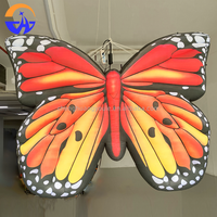 Costume gonflable publicitaire personnalisé en Oxford, modèle papillon avec lumières LED, facile à installer pour les défilés, propulsé par l'effort humain