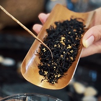 Thé en vrac parfumé à l'osmanthus, directement de l'usine du Yunnan, arôme floral sucré, expérience bien-être agréable, personnalisable.