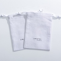 Pochette cadeau personnalisée en sergé 100% coton recyclable, blanche, avec cordon de serrage et logo personnalisé pour l'emballage de jouets