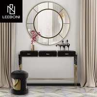 Table d'entrée contemporaine en laiton et marbre noir de luxe léger tables consoles élégantes
