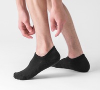 Chaussettes de sport en gros pour hommes, montantes jusqu'au genou, épaisses, élastiques, à compression, en coton et élasthanne, noires, pour la course en extérieur et le volleyball