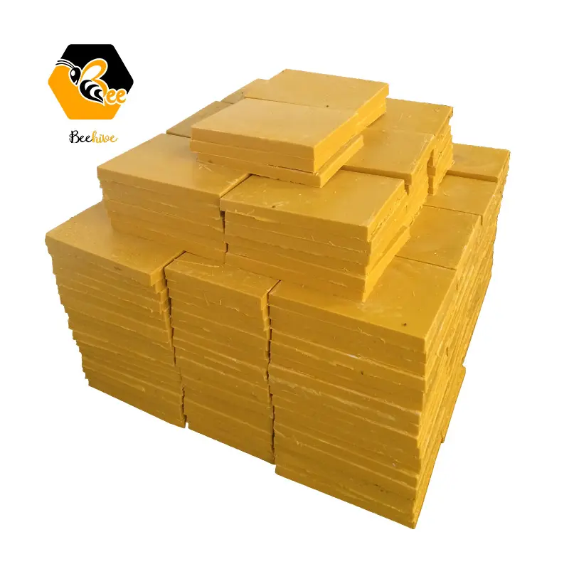 Fornitura di fabbrica all'ingrosso naturale organico raffinato commestibile 100% puro blocco grezzo giallo miele cera d'api lastra cera d'api per cosmetici