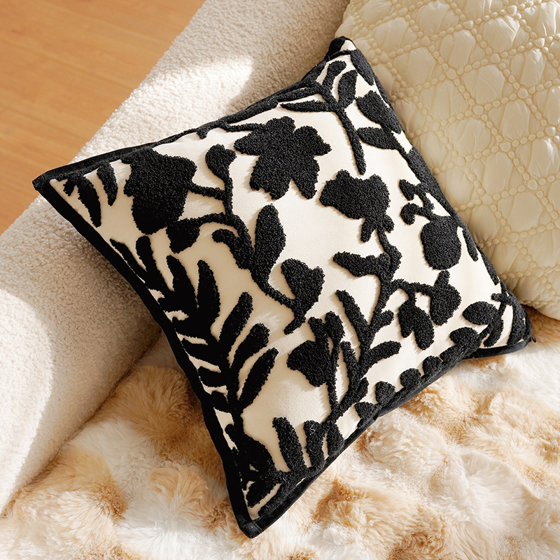 Funda de cojín de 45x45 cm con borde negro, fondo blanco y diseño floral francés.
