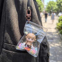 Cadeaux DIY : Porte-clés en peluche PVC transparent, pendentif poupée floquée, mini jouet de dessin animé avec sequins en forme de cœur, breloque de sac
