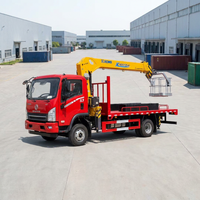 Camion-grue à structure métallique pour la levée de poutres en acier, l'installation de cadres et les projets d'ingénierie de structures métalliques