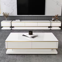 Table basse et meuble TV modernes en dalles de roche noires et dorées, avec structure en acier réglable, durables et écologiques, pour salon