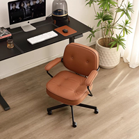 Chaise de bureau exécutive moderne ergonomique de conception récente en cuir avec base en aluminium, cadre en bois, hauteur réglable, pour usage domestique ou professionnel.
