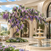 Grand arbre artificiel de glycine naturelle courbée avec des fleurs violettes réalistes pour la décoration commerciale des halls de centres commerciaux, des atriums et des halls d'hôtels