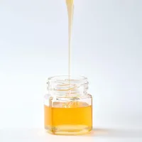 Stock de Noël des Fabricants : Mini Pot à Miel en Verre Hexagonal de 1.5oz avec Dipper en Bois