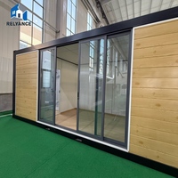 Maison conteneur à panneaux sandwich isolés, structure d'expédition étanche et résistante au feu, design moderne, vente chaude 20ft/40ft