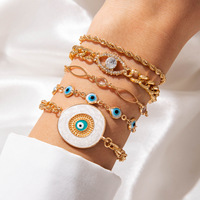 Conjunto de brazalete de ojos malvados azules de estilo exagerado bohemio, pulsera de perlas chapada en oro para mujer, joyería de moda