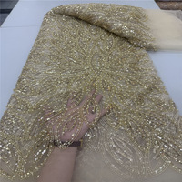 Tissu en dentelle perlée de luxe 2026 avec sequins et perles pour robes de mariée et de soirée haut de gamme