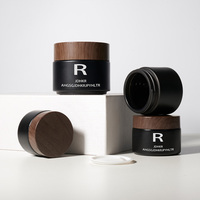 Pot en verre cosmétique vide noir mat de luxe personnalisé pour crème visage et corps, avec couvercles en bois foncé, disponible en 5g, 10g, 15g, 20g, 30g, 50g, 100g, 1oz, 2oz