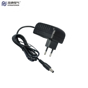 อะแดปเตอร์แปลงไฟแบบเสียบปลั๊ก OEM/ODM 24W แรงดันไฟฟ้าขาเข้า 90-264Vac แรงดันไฟฟ้าขาออก 5/9/12/24Vdc มาตรฐาน CE/FCC Class II Level VI สำหรับเราเตอร์/ไฟ LED Hynapower รุ่น HP-A24S - Product Image 1