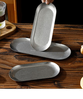Plateaux ovales élégants en acier inoxydable, compatibles lave-vaisselle, pour la décoration de table de traiteur et l'organisation de maquillage
