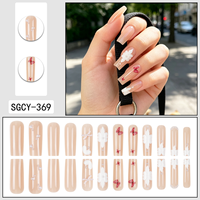 Faux ongles à presser longs forme cercueil, base nude, motif fleur blanche, papillon rouge, nœud perlé, réutilisables, vente en gros usine
