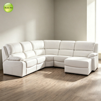 Canapé d'angle modulable de luxe en cuir en forme de L avec fonction inclinable et porte-gobelets pour grands espaces familiaux