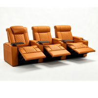 Fauteuil de cinéma inclinable électrique 3 places de designer avec accoudoirs multimédias et tables pivotantes, canapé en cuir premium
